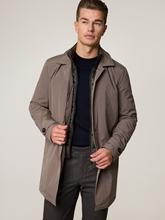 Bild von Regenmantel mit Blende