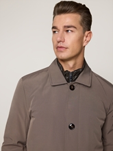 Bild von Regenmantel mit Blende