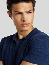 Bild von Polo-Shirt aus Strick