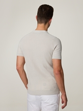 Image sur Polo tricoté de coupe régulière