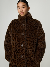 Image sur Manteau court en fausse fourrure