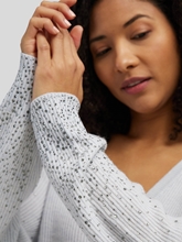 Bild von Strickjacke mit Strasssteinen