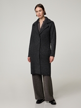 Image sur Manteau en tricot avec broche