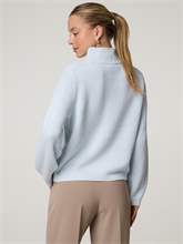 Bild von Pullover mit Strasssteinen