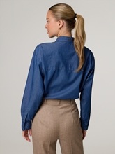 Bild von Schluppenbluse aus Denim