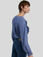 Bild von Rüschenbluse mit Punkten