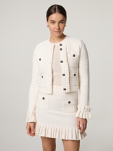 Bild von Strickjacke mit Rüschen