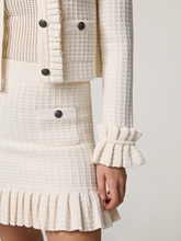 Bild von Strickjacke mit Rüschen