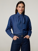 Bild von Schluppenbluse aus Denim