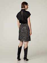 Bild von Minijupe mit Pailletten