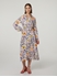 Bild von Printkleid mit Leinen