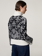 Bild von Strickjacke mit Wolle