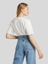 Image sur T-shirt à logo DASHIRE