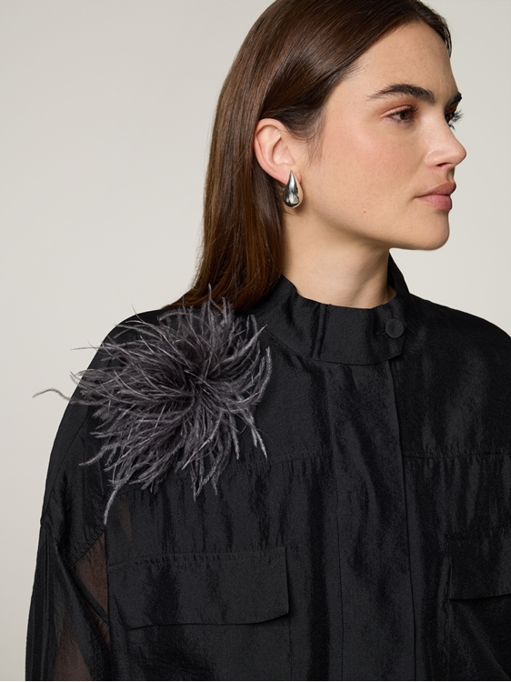 Bild von Brosche aus Federn