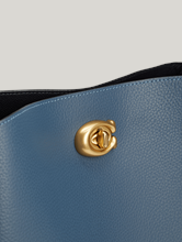 Bild von Schultertasche