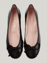 Bild von Ballerinas mit Schleife